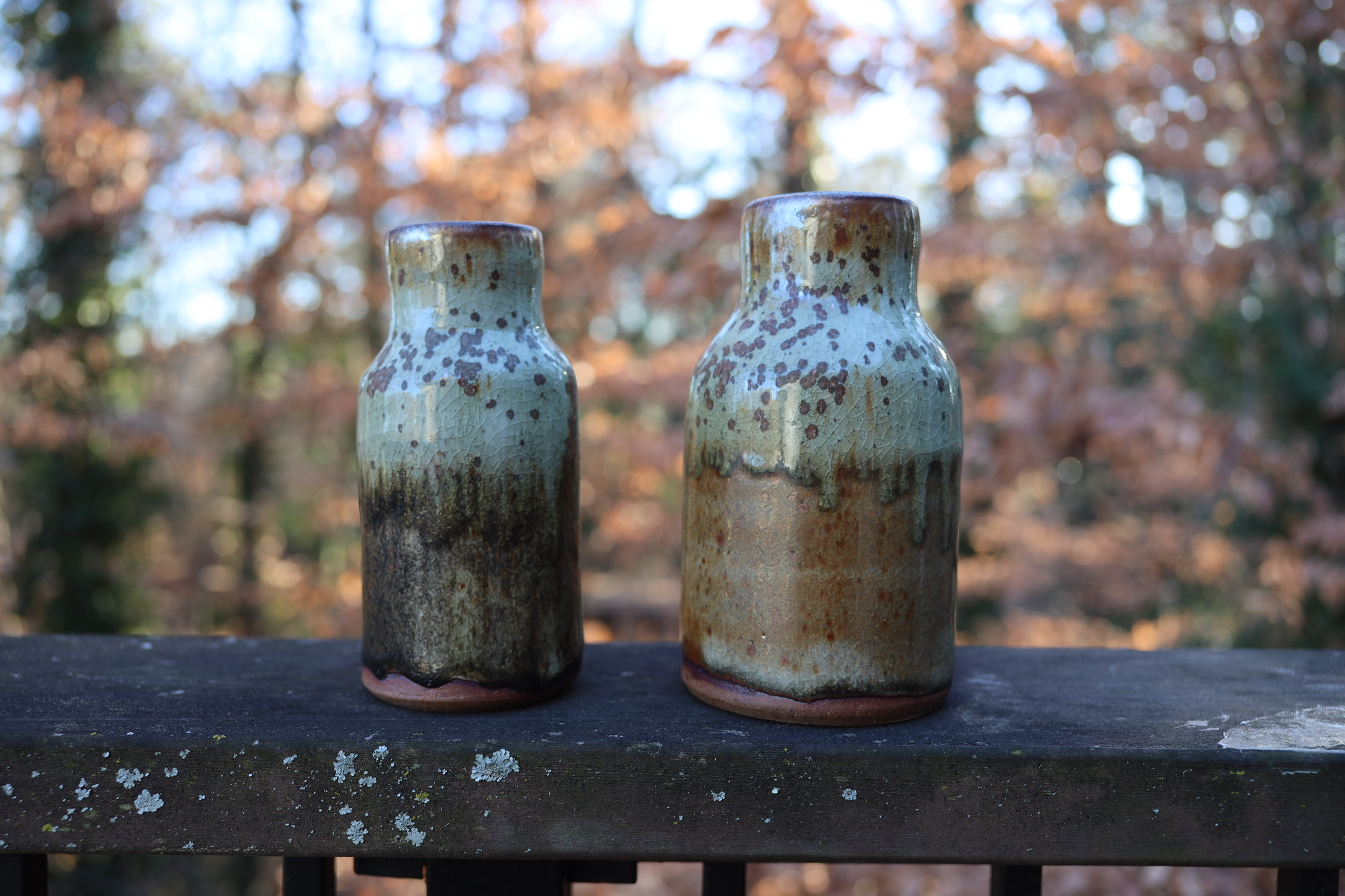 Shino Water Pitchers — brown stoneware with iron spotting